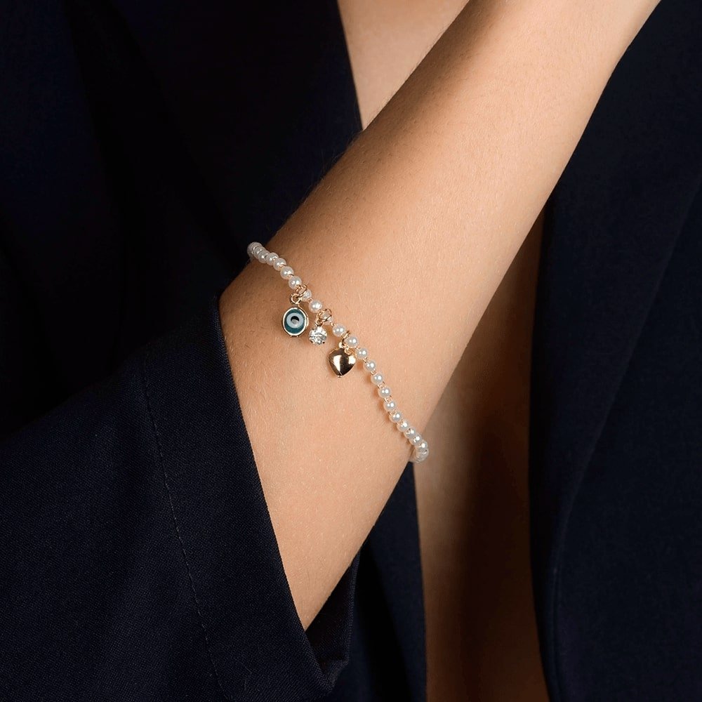 Pulseira Dourada de Pérolas com Olho Grego Coração e Ponto de Luz Flore