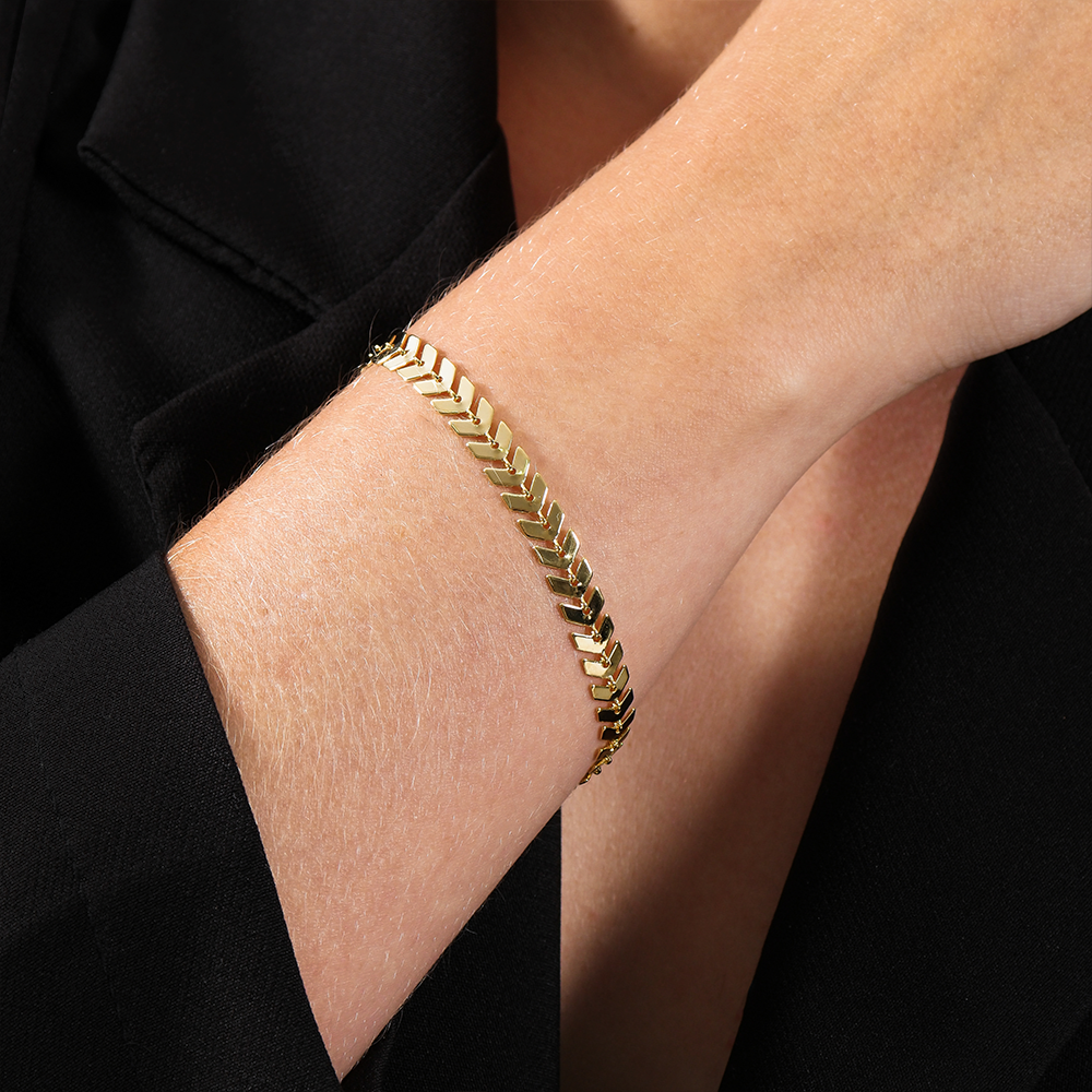 Pulseira Dourada de Seta Flore